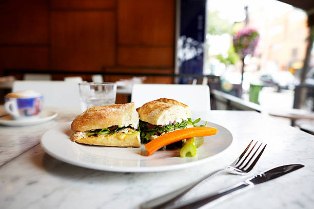 istock Chicken sandwich lunch on table at an outdoor restaurant 179725412