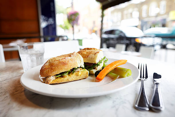 istock Chicken sandwich lunch on table at an outdoor restaurant 179725413