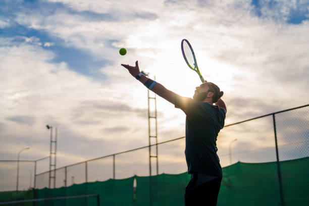 istock Man serving the tennis ball 1797258198
