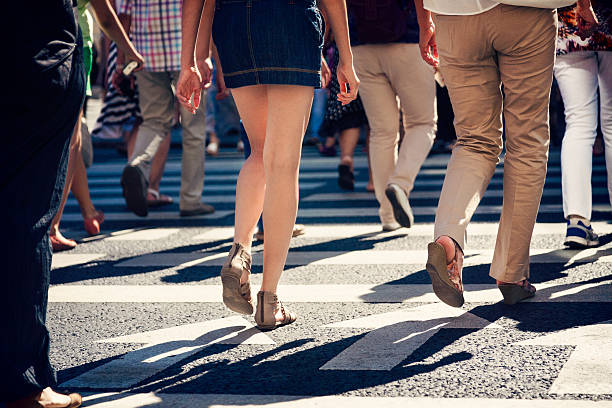 istock Pedestians crossing street 179725906