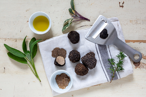 Truffle mushrooms with olive oil, truffle shaver and herbs.