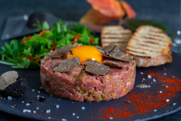 Beef tartar with truffle stock photo