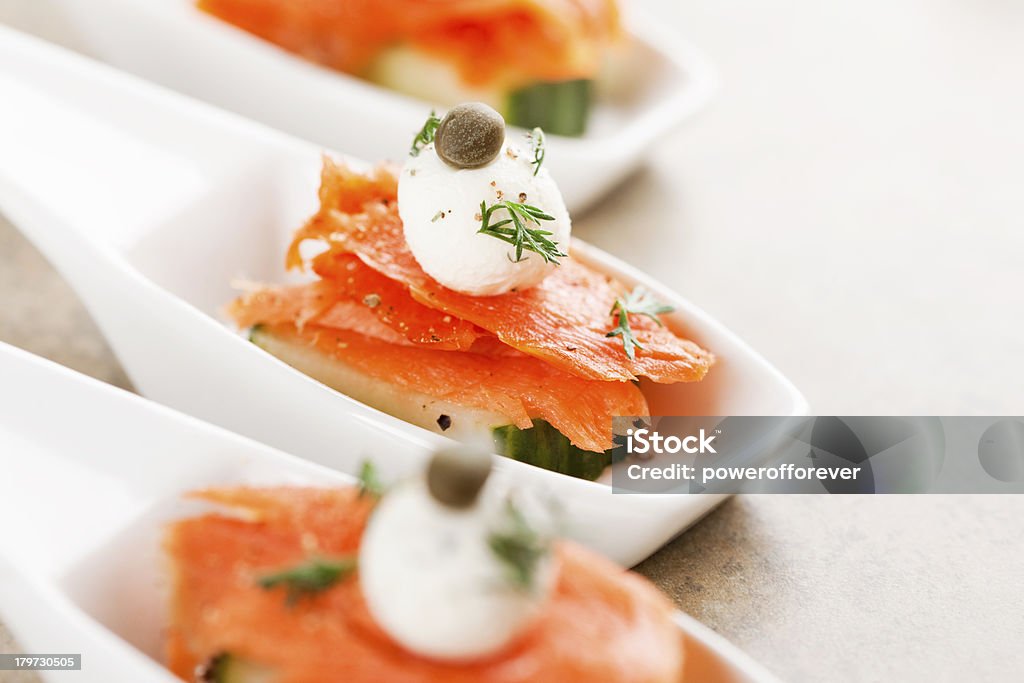 Smoked Salmon Appetizer Smoked salmon appetizer with cream cheese and capers. Amuse Bouche Stock Photo