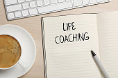 phrase-life-coach-geschrieben-in-notizbuch-stift-tasse-kaffee-und-tastatur-auf-holztisch-flach.jpg?b=1&s=170x170&k=20&c=hMlmMg-tV4Rb3HA9-kheBcvWvijln_HWwXIEXhwCDrY=
