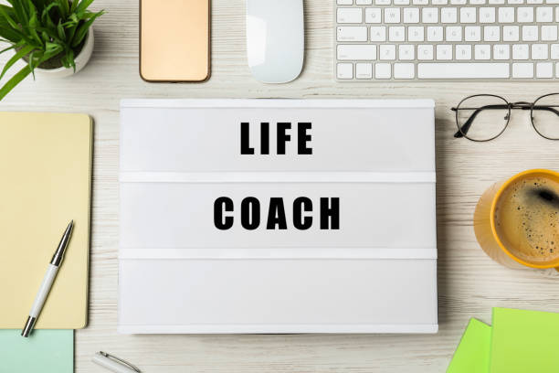 istock Lightbox with phrase Life Coach and stationery on wooden table, flat lay 1797306706
