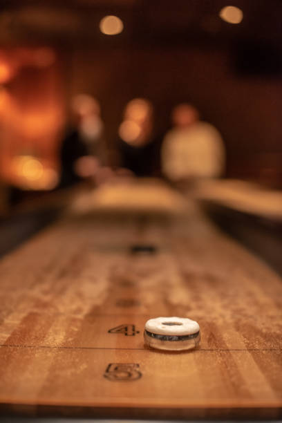 istock Playing the game of shuflleboard.. 1797353641