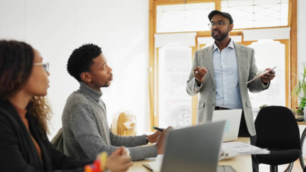 istock Young executives brainstorming ideas at startup office 1797373534