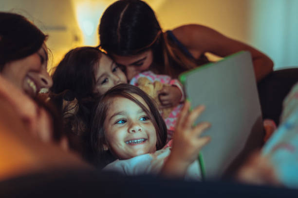 istock Family at home: mothers and daughters relaxing at home 1797392204