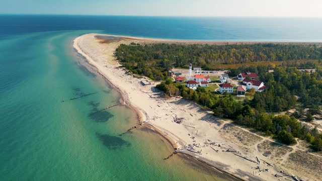 Aerial ascent of Whitefish Point Lighthouse and Great Lakes Shipwreck Museum, Michigan