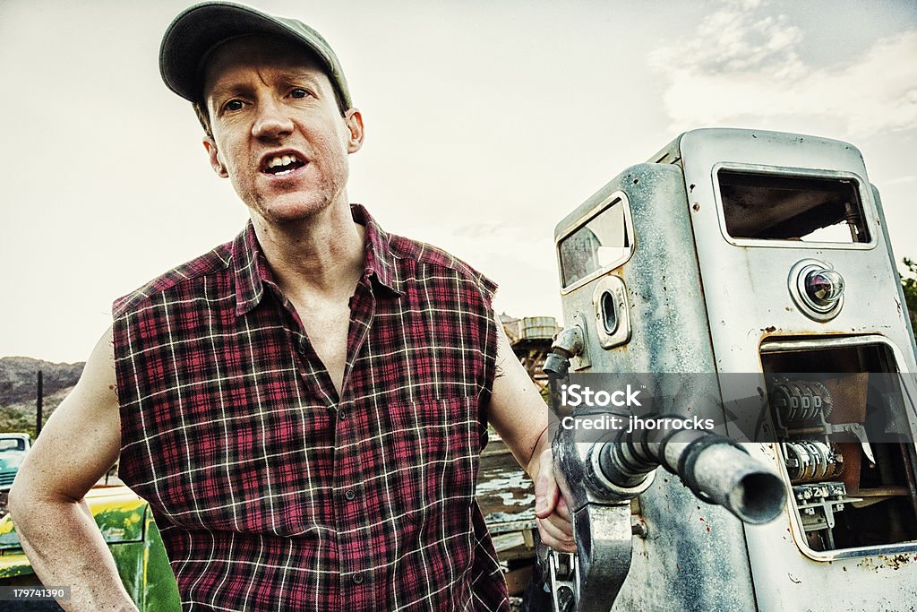 Redneck Encargado de la gasolinera - Foto de stock de Persona rural libre de derechos