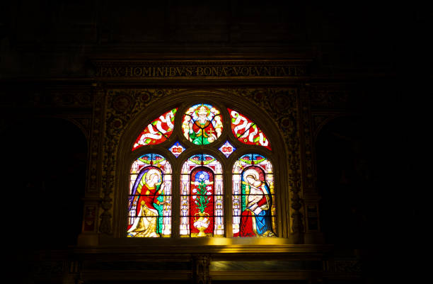 Paris, France: Stained Glass Window Inside Saint-Eustache Church Paris, France: A stained glass window inside the Church of Saint-Eustache, a Gothic structure completed in 1637 and located in the 1st arrondissement. The window has a date of 1843 on it. église saint eustache stock pictures, royalty-free photos & images