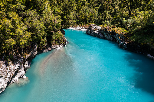 Hokitika Gorge a major tourist destination some 33 kilometres from Hokitika, New Zealand. The turquoise colour is due tor glacial flour, in the water. The silt is so fine it remains in suspension in the water.
