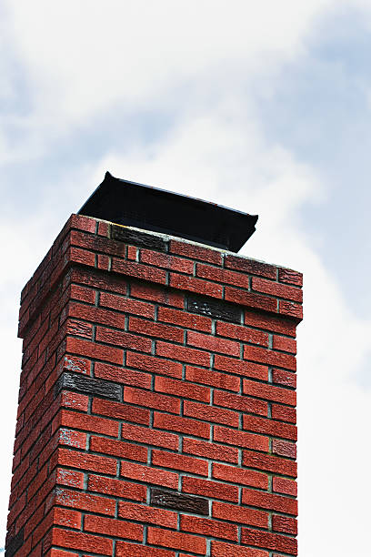 Red Brick Chimney With Metal Cap