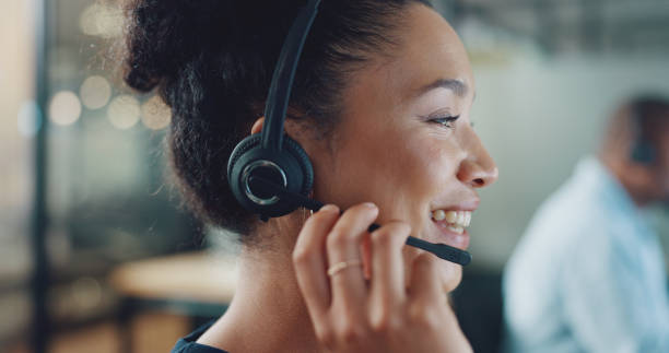 istock Woman, consultant and customer care with headset for telecom in office for technical support, consultation or sales. Female, employee or agent for working, online or inbound marketing with clients 1797485647