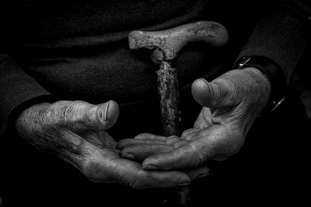 istock The hands of an Elder with a cane 1797487822