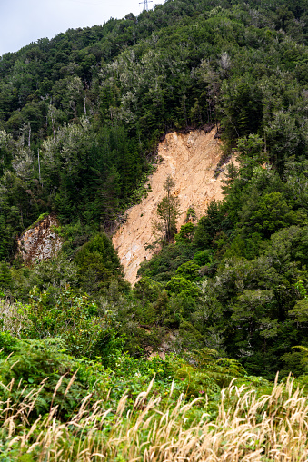 Gravity is the primary driving force for a landslide to occur,. In many cases, the landslide is triggered by a specific event (such as a heavy rainfall, an earthquake, a slope cut to build a road, and many others), although this is not always identifiable.