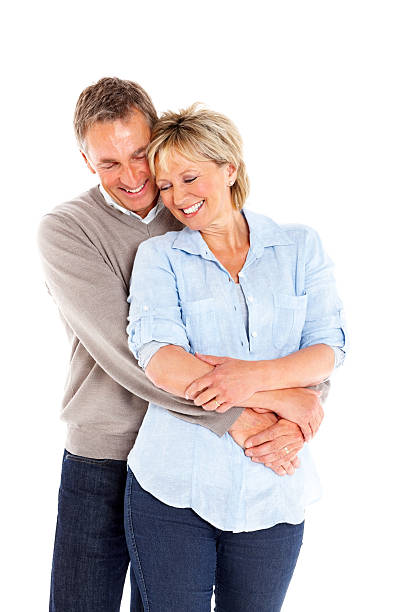 istock Romantic mature couple embracing on white 179749320