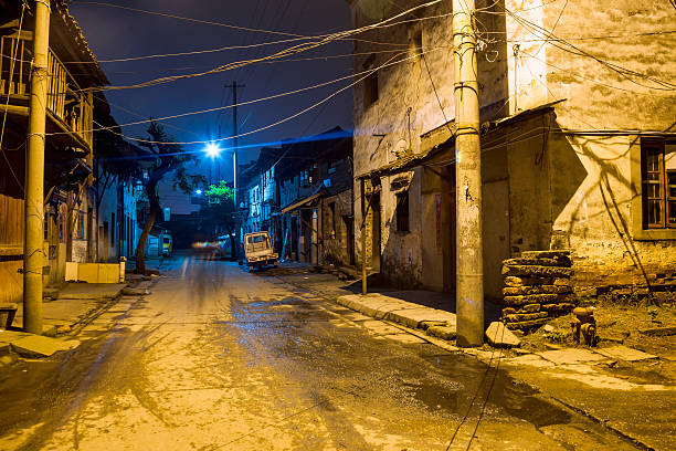 istock old alley at night 179751412