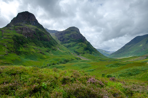 Beautiful landscape with Glencoe or Glen Coe mountains. An beautiful view over landscape in the Scottish Higlands, Scotland. UK. View of the Hidden-valley in the Scottish Highlands.