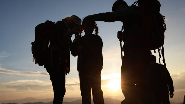 istock Backpacker family with daughter travel in forest 1797545432