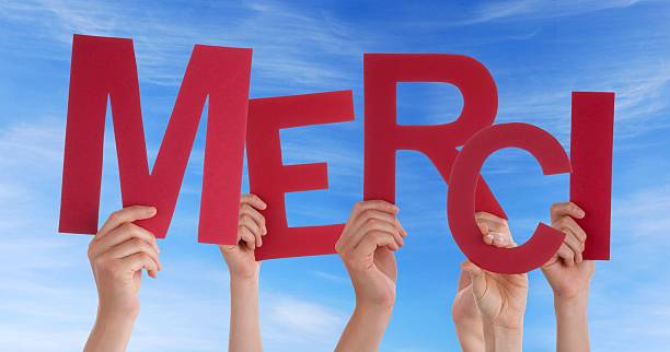 istock Many Hands Holding a Red merci 179756274