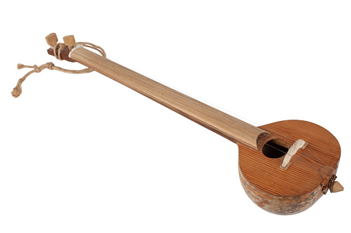 Turkish tambur. Long-necked folk string instrument of the lute family. Isolated on white background.