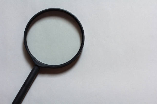 istock magnifying glass on gray background 1797572630