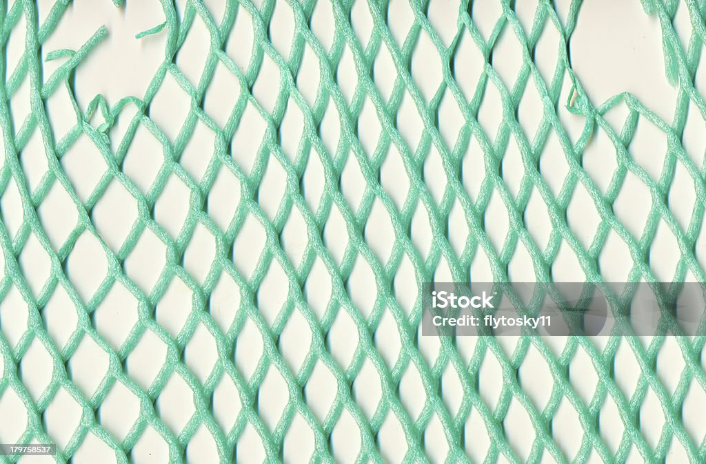 Danificado plástico em mesh - Foto de stock de Abertura royalty-free