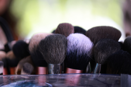 Close-up makeup brush prepared for the model. Make-up artist kit