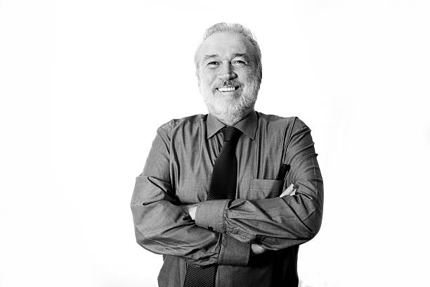 portrait d'un homme d'affaires senior - image en noir et blanc photos et images de collection