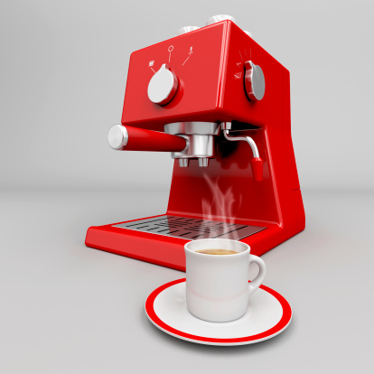 Hot espresso in front of professional espresso machine