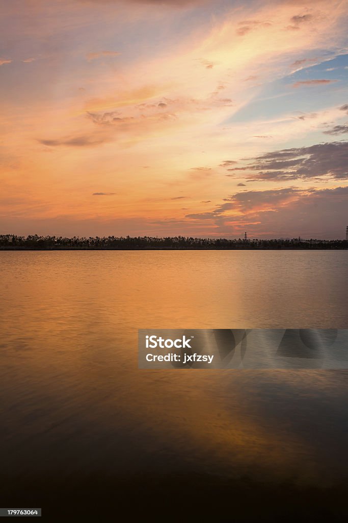 sunshine over lake sunshine near sunset over a lake Beauty In Nature Stock Photo