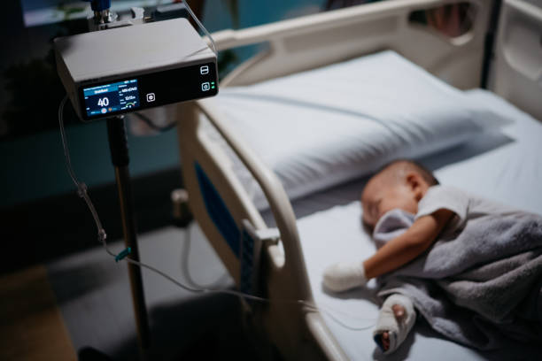 istock Little asian boy patient with IV drip in hand 1797637059