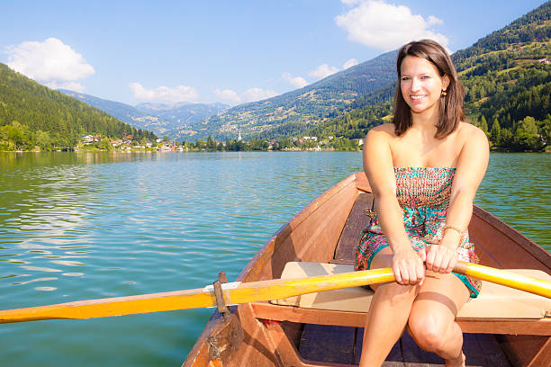 Young Woman In A Boat On The Lake stock photo