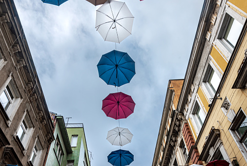 Sarajevo, Bosnia and Herzegovina - November 11, 2023: Umbrellas over Ferhadija Street: a beautiful way to celebrate autumn in Sarajevo