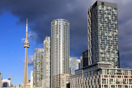 CN Tower and residential buildings in downtown Toronto, Ontario, Canada.