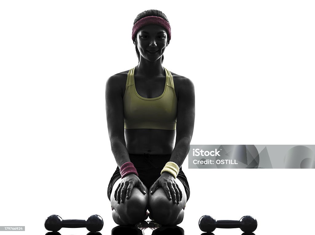 Donna esercizio allenamento fitness weigths silhouette - Foto stock royalty-free di Abbigliamento casual