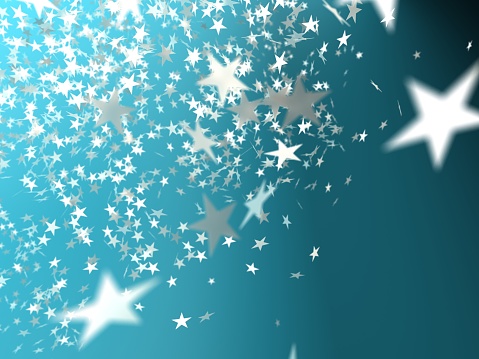 golden confetti stars falling with copy space