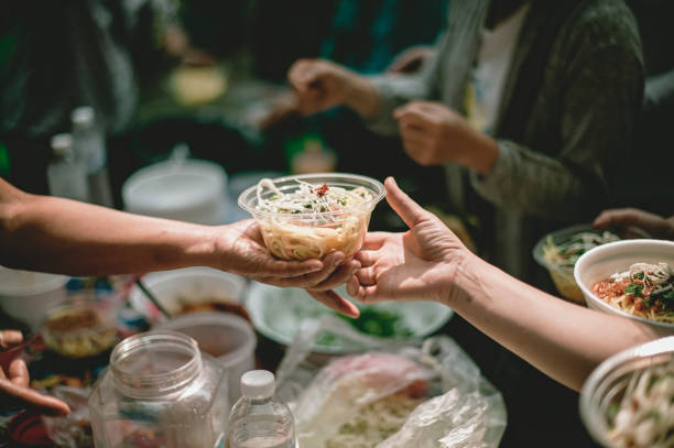 Volunteer concept to donate ready-to-eat food to the hungry and poor