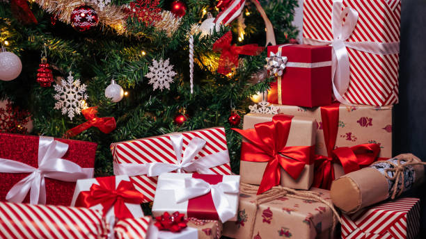 istock Under a modern Christmas tree, elegantly wrapped gift boxes, holiday Xmas 1797727031
