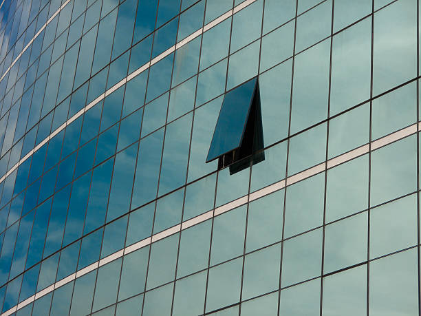 istock modern blue glass wall of skyscraper 179773217