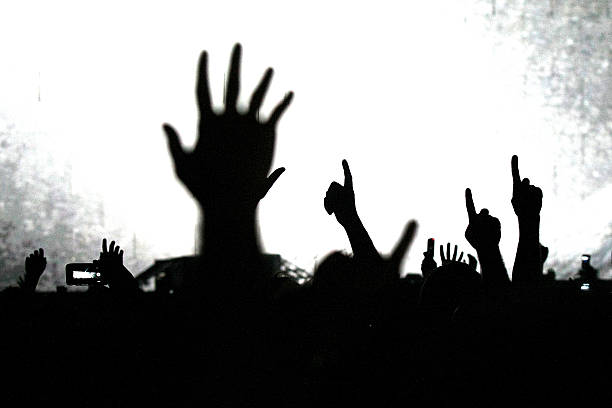 istock cheering crowd at a rock concert 179773823