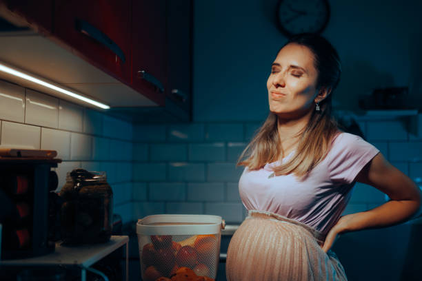 istock Pregnant Woman Suffering Backaches in her Third Trimester 1797747397