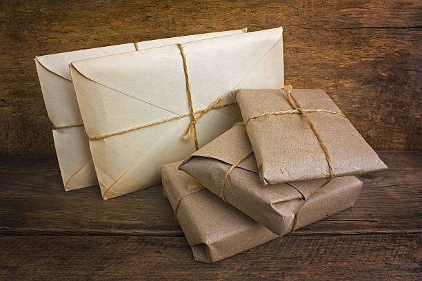istock Postage on the background of an old board 179774859