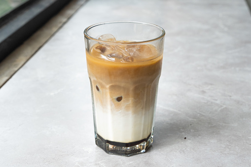a glass of iced latte coffee. iced latte at the coffee shop