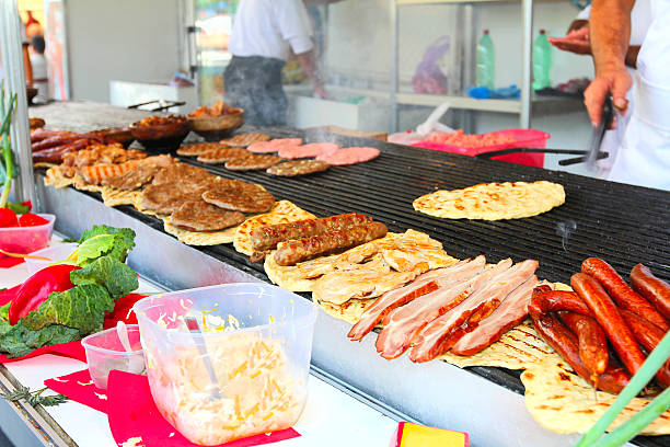 istock grilling a burger on the BBQ 179776204