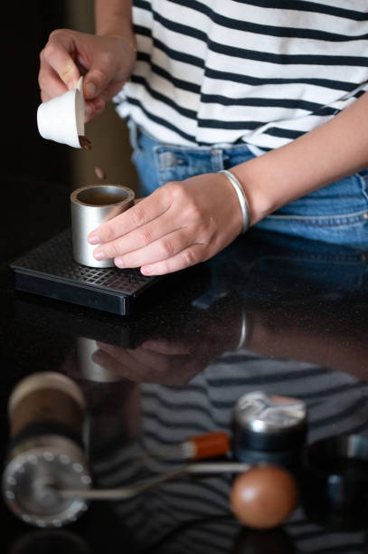 istock Woman preparing coffee at home 1797763931