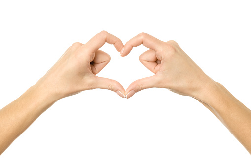 Heart shape. Woman hand with french manicure gesturing isolated on white background. Part of series