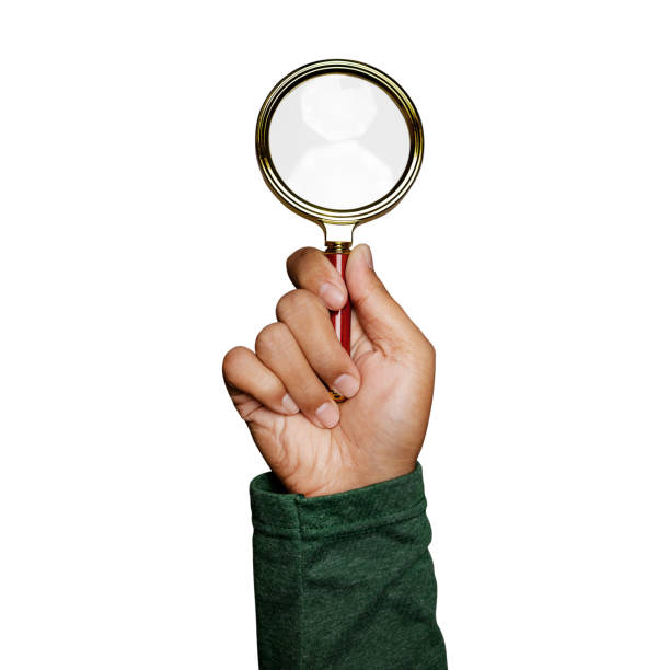 Hand holding magnifying glass isolated on white background. Data Search. clipping paths.