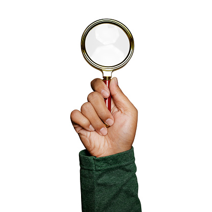 Hand holding magnifying glass isolated on white background. Data Search. clipping paths.